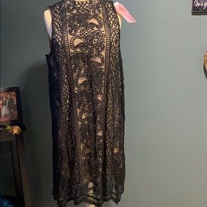 Woman’s large black dress with tan underlay NWT